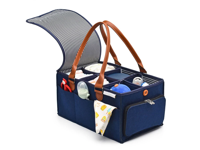 Portable felt diaper caddy organizer with compartments, leather handles and baby essentials storage banner