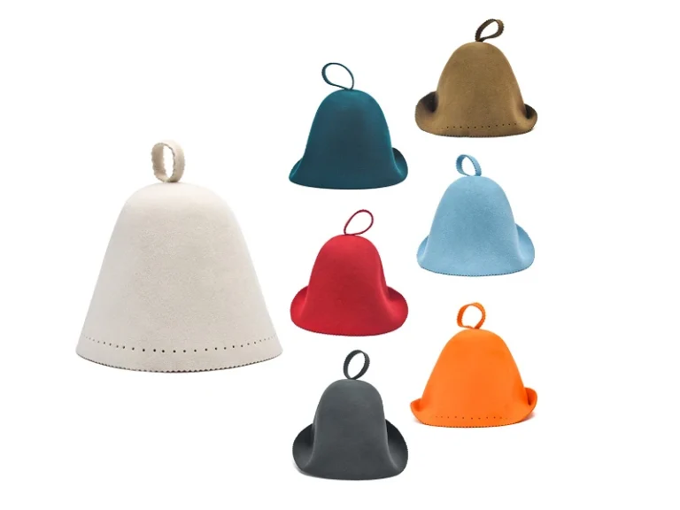 Zoe seamless one-piece molded felt sauna hats in various colors with a top loop design for spa and wellness businesses banner